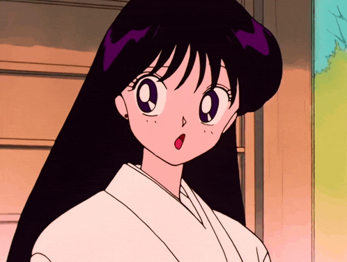 a girl with long black hair is wearing a white shirt