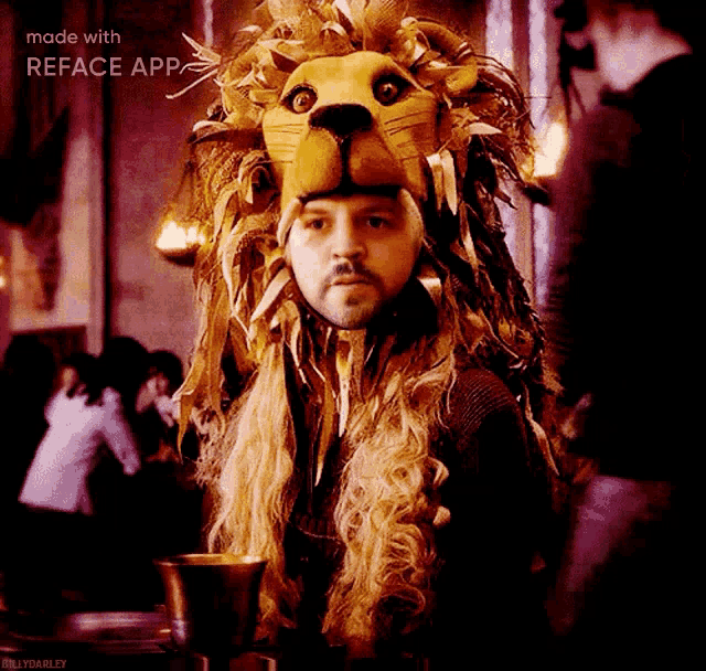 a man is wearing a lion mask with a reface app on the bottom