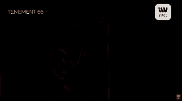 a man and a woman are standing next to each other in a dark room with tenement 66 written on the bottom