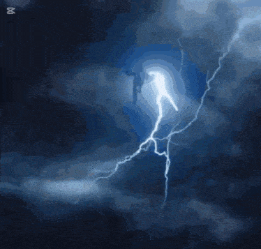 a silhouette of a person being struck by lightning with the letter t on the bottom right