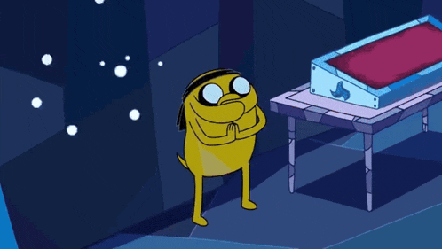 a cartoon character is standing next to a table with a red blanket on it