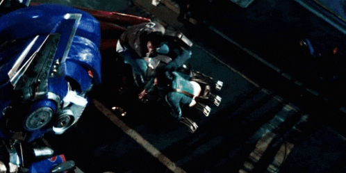 an aerial view of a robot with the word transformers written on it