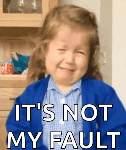 a little girl is crying with the words it 's not my fault written below her