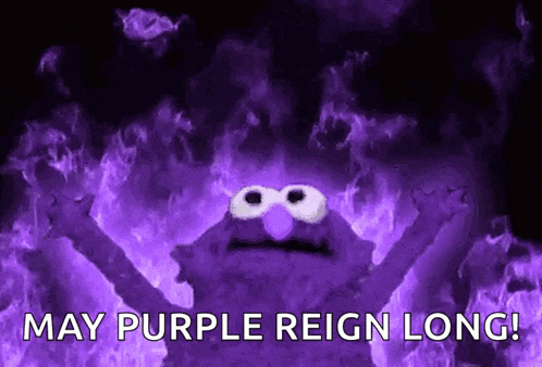 a purple monster is surrounded by purple flames and the words may purple reign long .