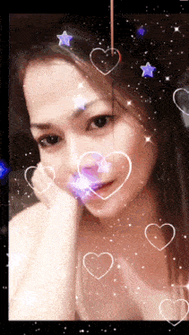 a woman is surrounded by hearts and stars on her face