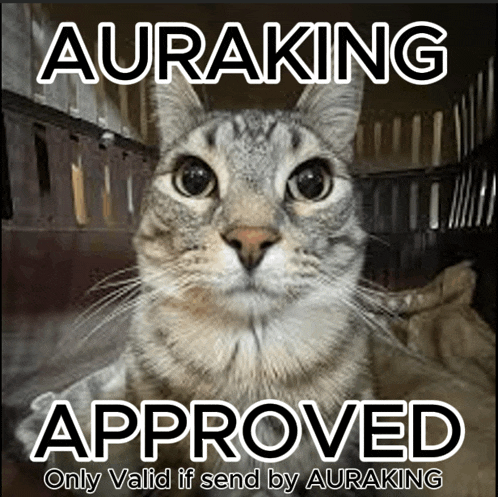 a cat is sitting in a cage with auraking approved on the bottom