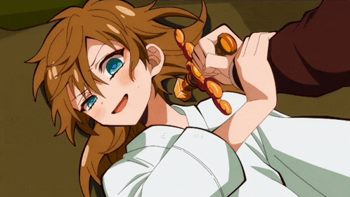 a girl with brown hair and blue eyes laying on the ground