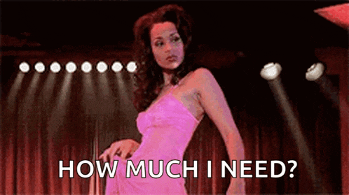 a woman in a pink dress is dancing on a stage while asking how much i need .