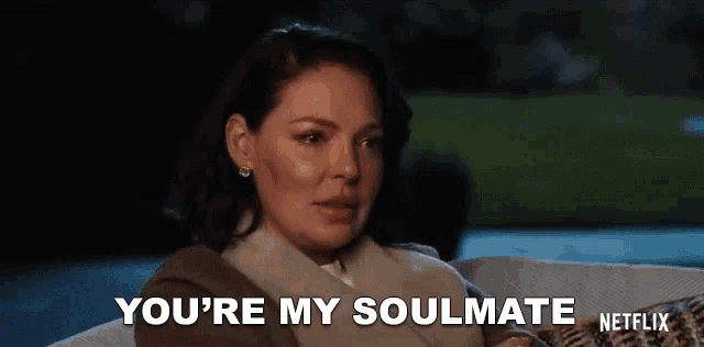a woman is sitting on a couch and saying you 're my soulmate netflix