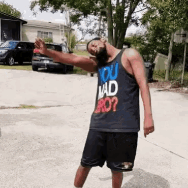 a man wearing a shirt that says " you mad bro "
