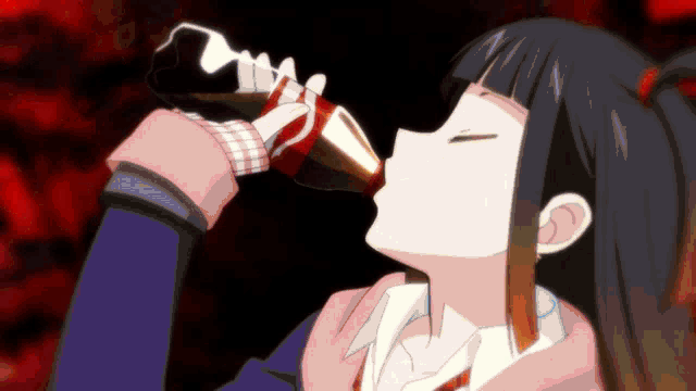 a girl drinking from a coca cola bottle in a dark room