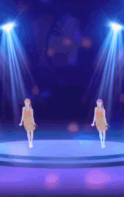 a couple of women standing on a stage with microphones in their hands