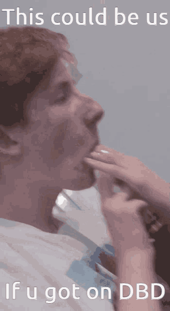 a man is licking another man 's hand with a caption that reads this could be us if i got on dbd