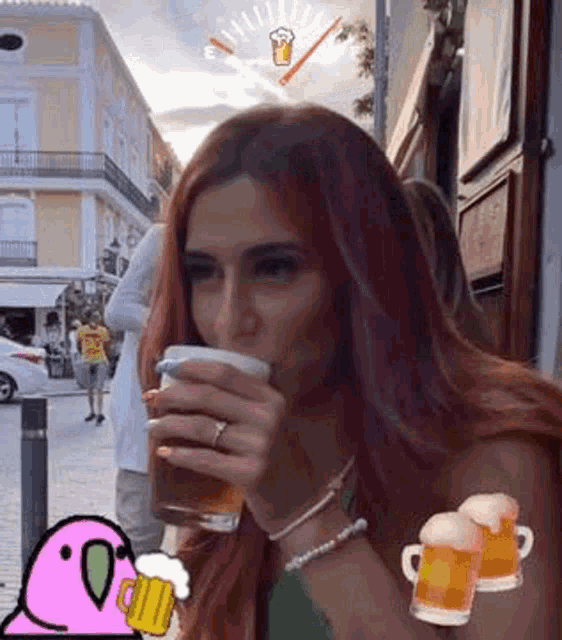 a woman is drinking a glass of beer on a sidewalk .