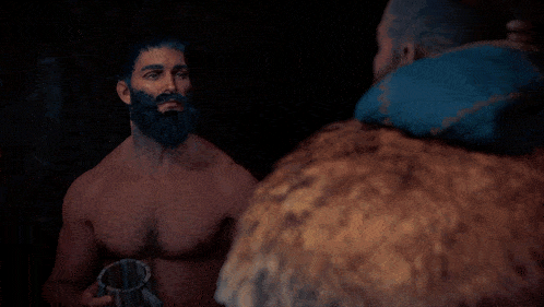a man without a shirt is drinking from a pitcher
