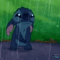 stitch from disney 's lilo and stitch is crying in the rain .