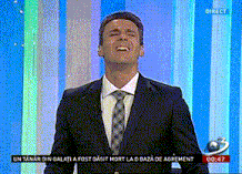 a man in a suit and tie is laughing in front of a screen that says direct on it