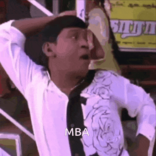 a man in a white shirt and black tie is making a funny face and says mba