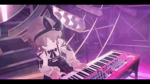 a girl is playing a keyboard on a stage .