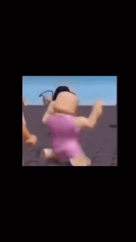 a girl in a pink shirt and shorts is standing next to another girl in a video game .