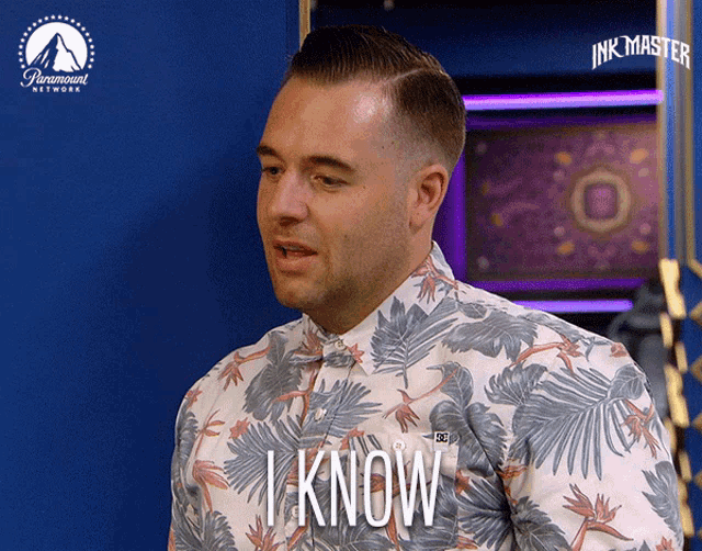 a man in a floral shirt says " i know "