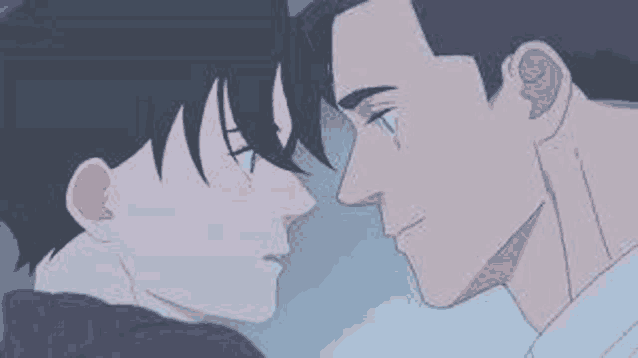 a couple of men are looking at each other 's faces .