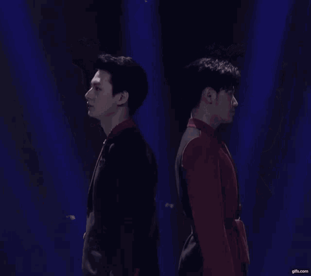 two men standing next to each other with gifs.com written on the bottom