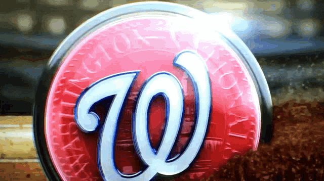 a washington nationals logo is on a red circle