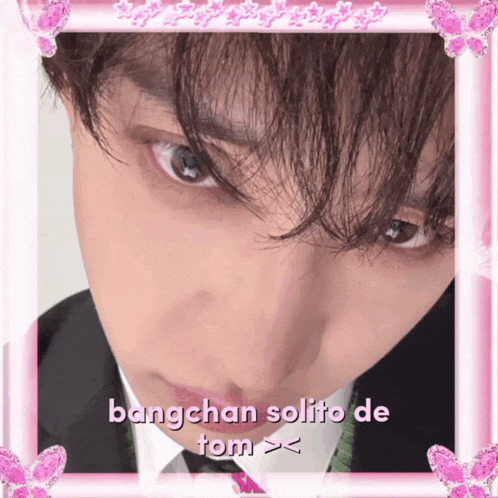 a close up of a man 's face with bangchan solido de tom written on it
