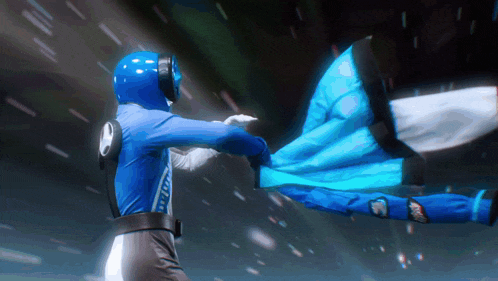a blue superhero is fighting a white superhero with a blue cape