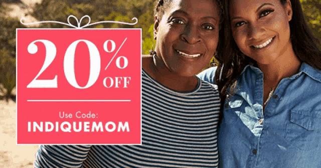 two women standing next to each other with a sign that says 20 percent off