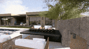 a patio with a fire pit and chairs in front of a modern house