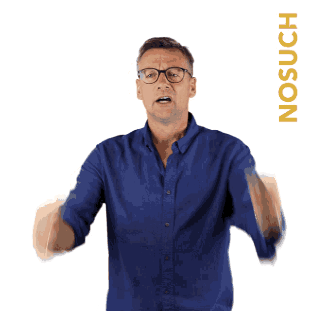 a man wearing glasses and a blue shirt is making a funny face with the word no such behind him