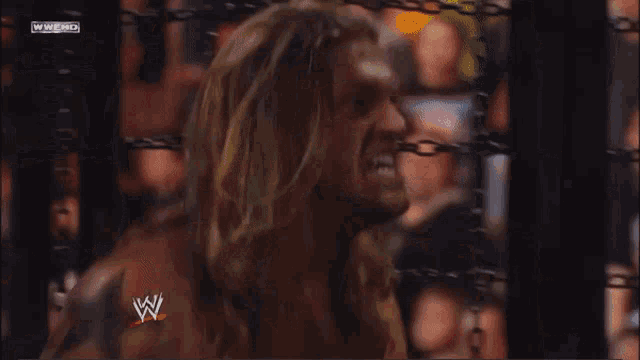 a wrestling match is being shown on a wwe channel