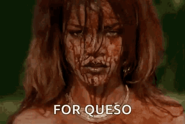 a woman with blood on her face and the words `` for queso '' written below her .