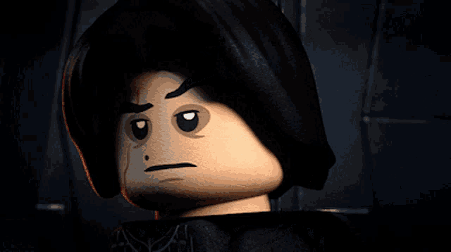 a close up of a lego character 's face with a smile on it