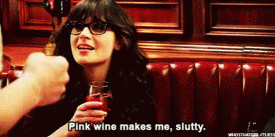 Zooey Deschanel Pink Wine Makes Me Slutty GIF - Zooey Deschanel Pink Wine Makes Me Slutty Drinking GIFs