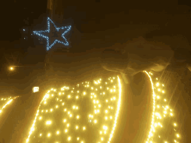 a christmas tree with a star in the background