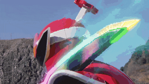 a pixelated image of a person wearing a red and white helmet and a sword