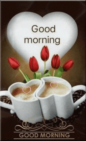 two cups of coffee in the shape of a heart with flowers and a heart shaped pillow that says good morning .