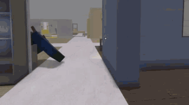 a person is walking down a hallway in a video game while holding a gun .
