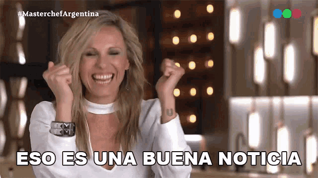 a woman is laughing with the words eso es una buena noticia written below her
