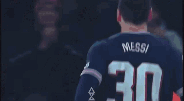 a man is hugging another man with the letter a on the bottom