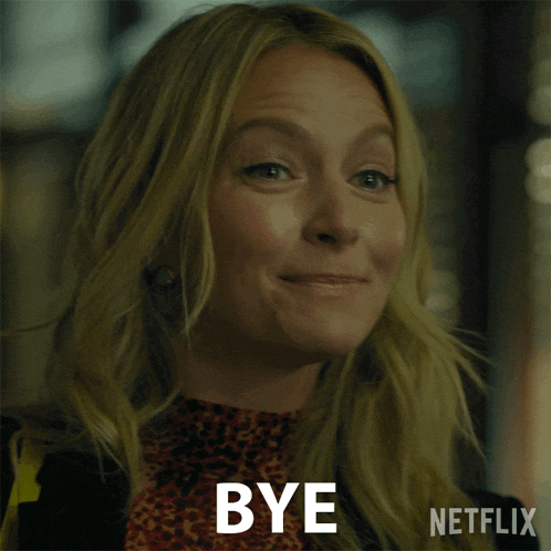 a woman with blonde hair is smiling and says bye