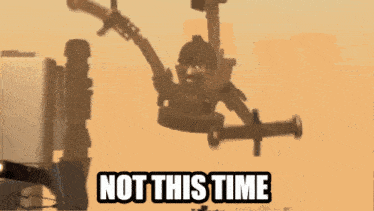 a picture of a robot with the words " not this time " above it