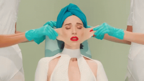 Stretched Skin Facial Service GIF - Stretched Skin Facial Service Clawlike Nails GIFs