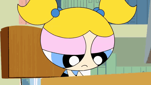 a close up of a cartoon character with blonde hair
