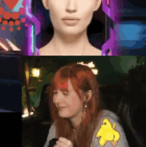 a woman with red hair and a yellow duck on her sleeve