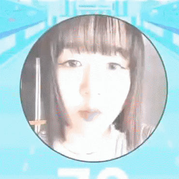 a woman 's face is shown in a circle with a blue background