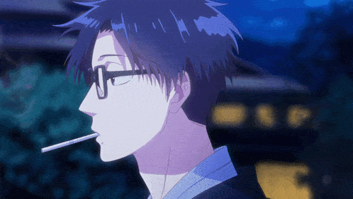 a man with glasses is smoking a cigarette in his mouth